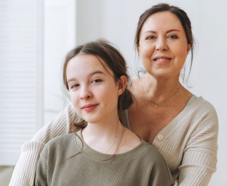 Compassionate Care-giver and a young teenager